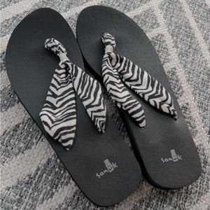 Sanuk Zebra flip flops